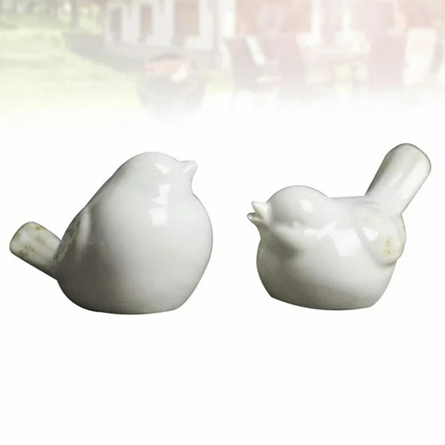 Uccelli uccelli statue in ceramica decorazioni figurine figurine blu figura figurine fauci libri fatteria decorazione crema